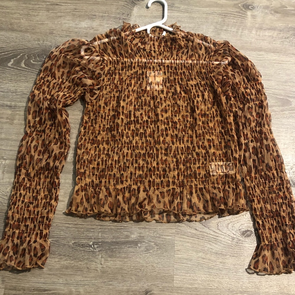Free People. Sheer cheetah print top